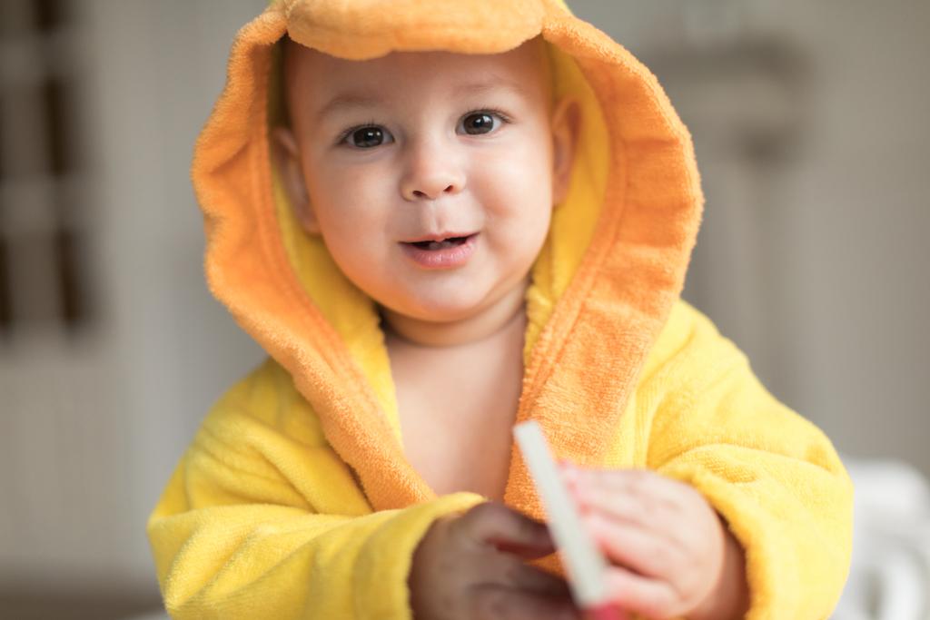 baby boy in yellow robe - Photo, Image