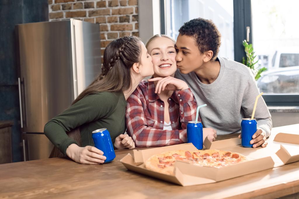 friends kissing girl - Photo, Image