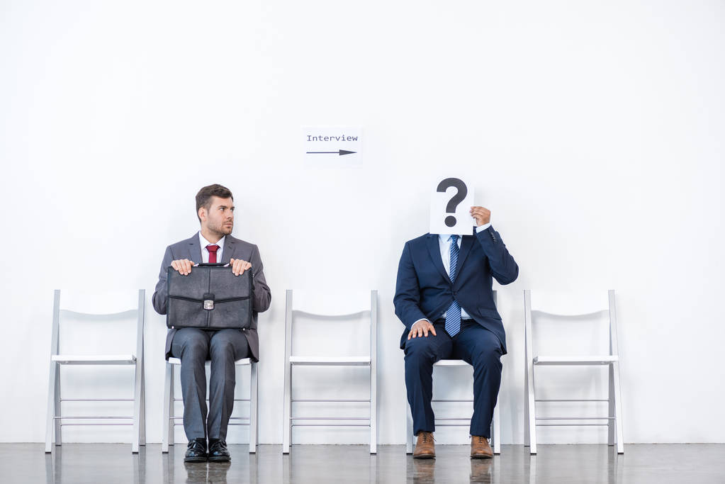 businessmen sitting on chairs - Photo, Image