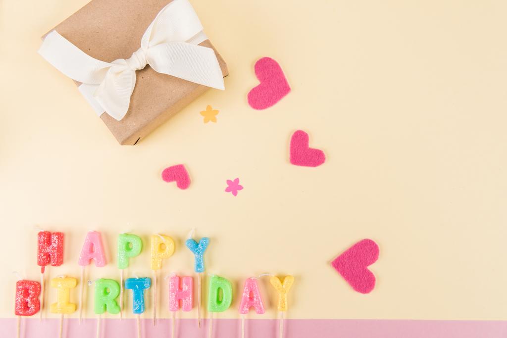Happy birthday lettering and gift box
 - Фото, изображение