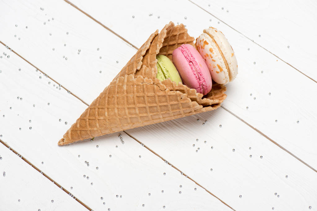 Colorful macarons in waffle cones - Photo, Image