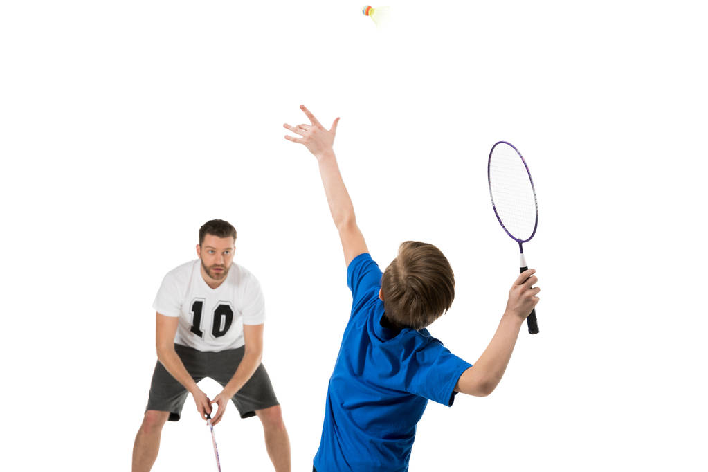 отец и сын играют в теннис
 - Фото, изображение