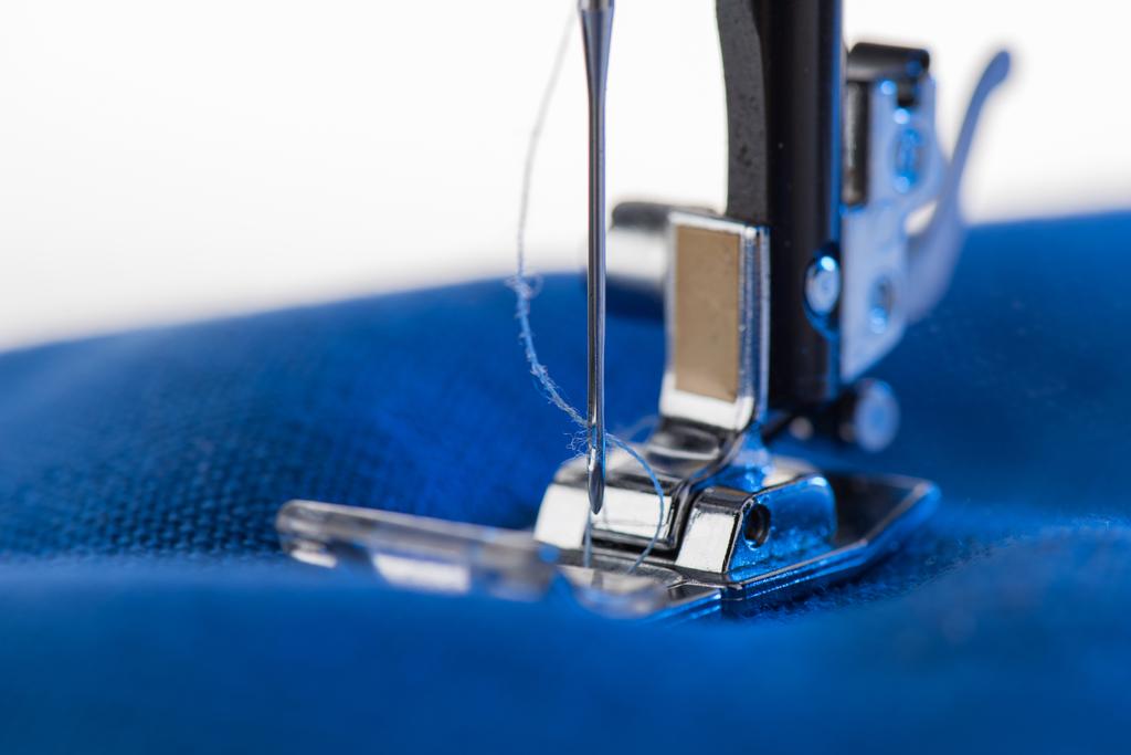 Máquina de coser de trabajo
  - Foto, imagen