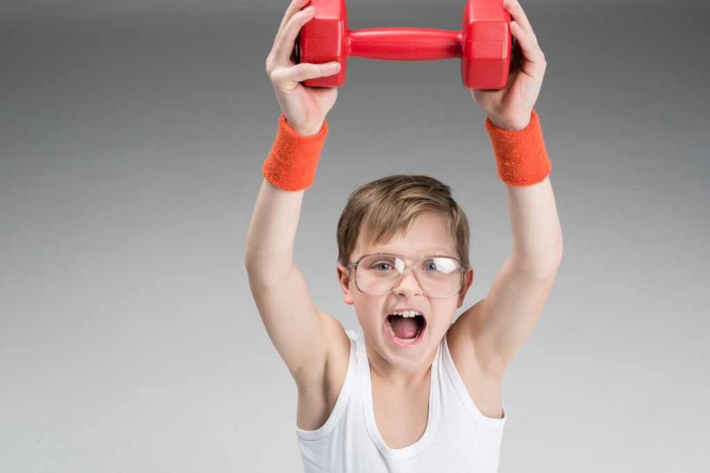 active boy with dumbbell - Photo, Image