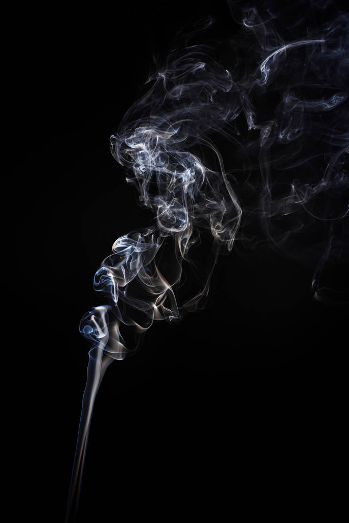 Bloccare il movimento del fumo su sfondo nero. Nuvole astratte di vapore
. - Foto, immagini