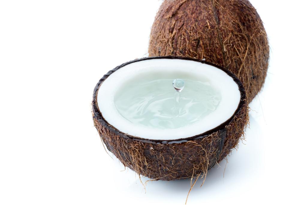 ripe tropical coconuts with water - Photo, Image