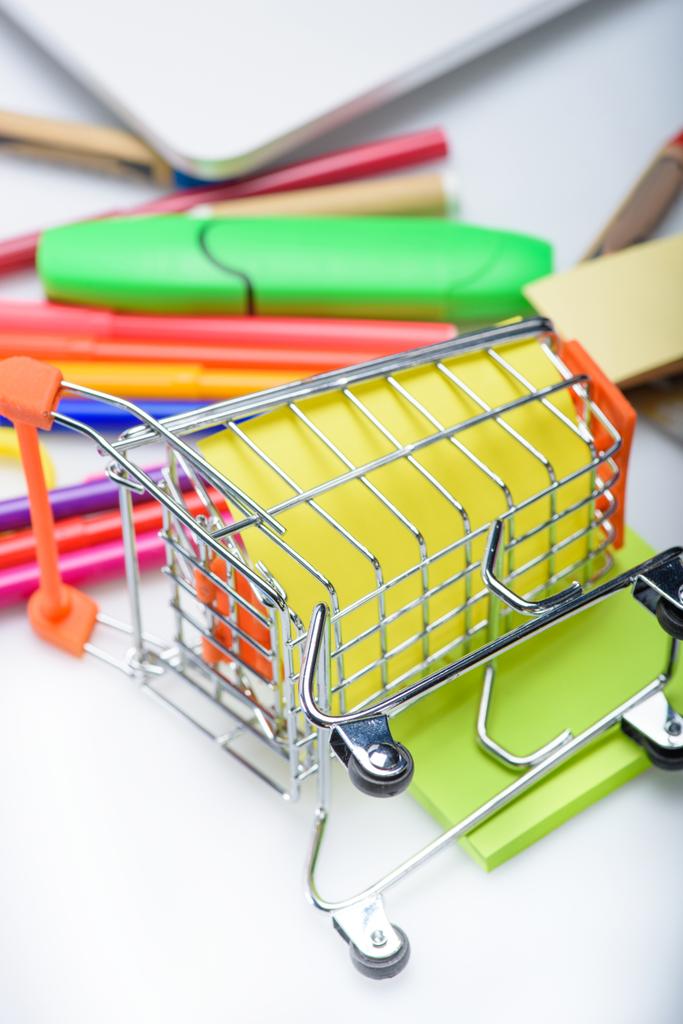 school supplies in shopping cart  - Photo, Image