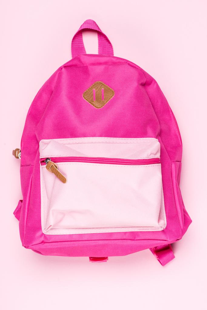 Lapsen pinkki koululaukku
   - Valokuva, kuva