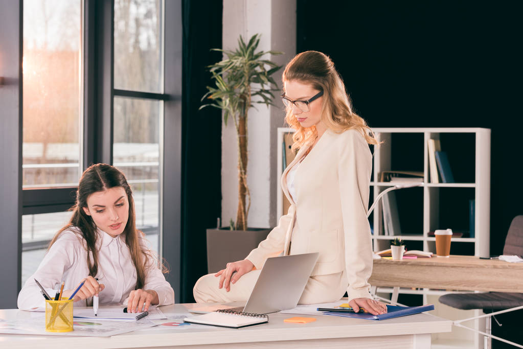 young businesswomen talking while working at office - Photo, Image