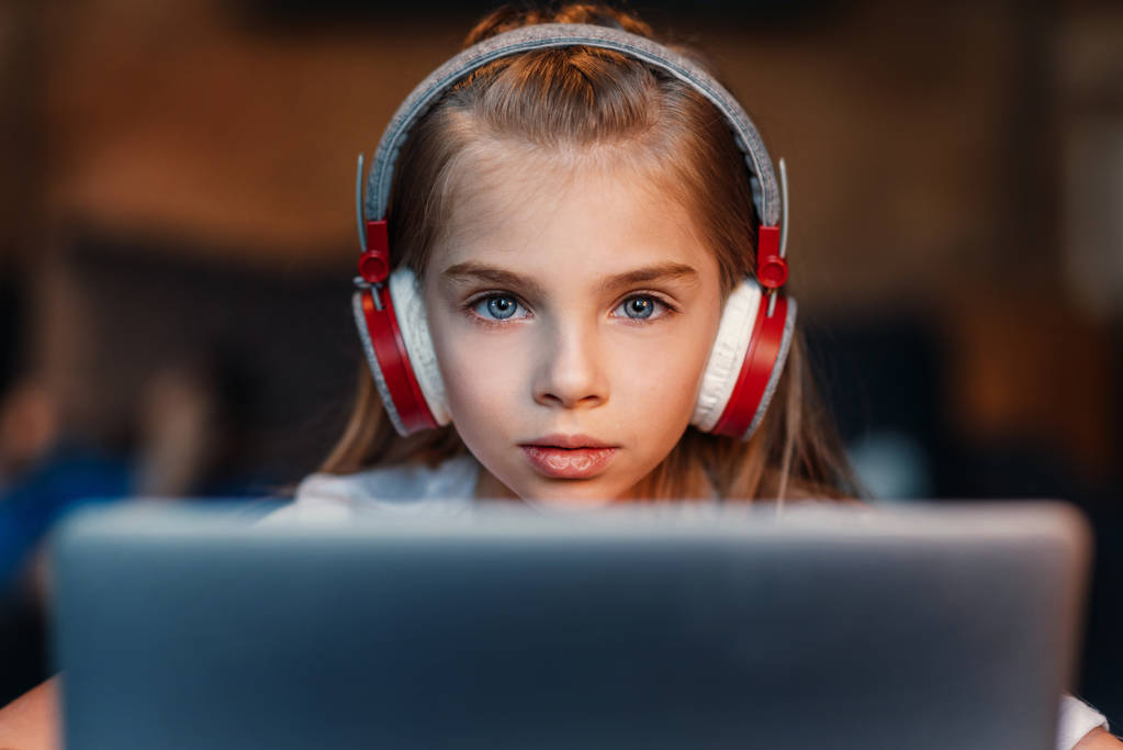 little girl in headphones - Photo, Image