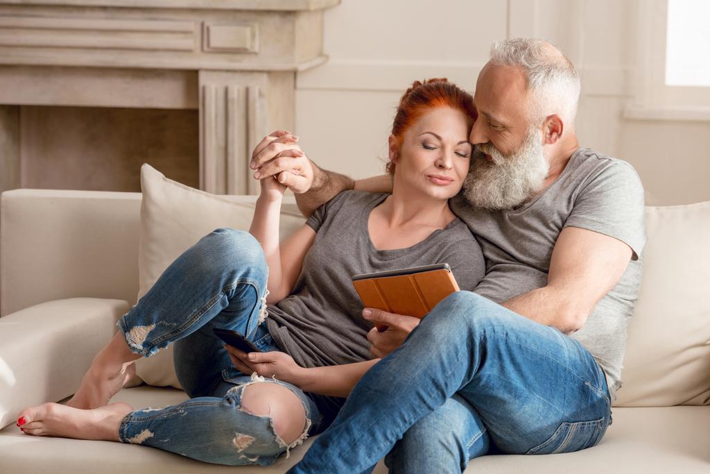 Mature couple with digital devices  - Photo, Image