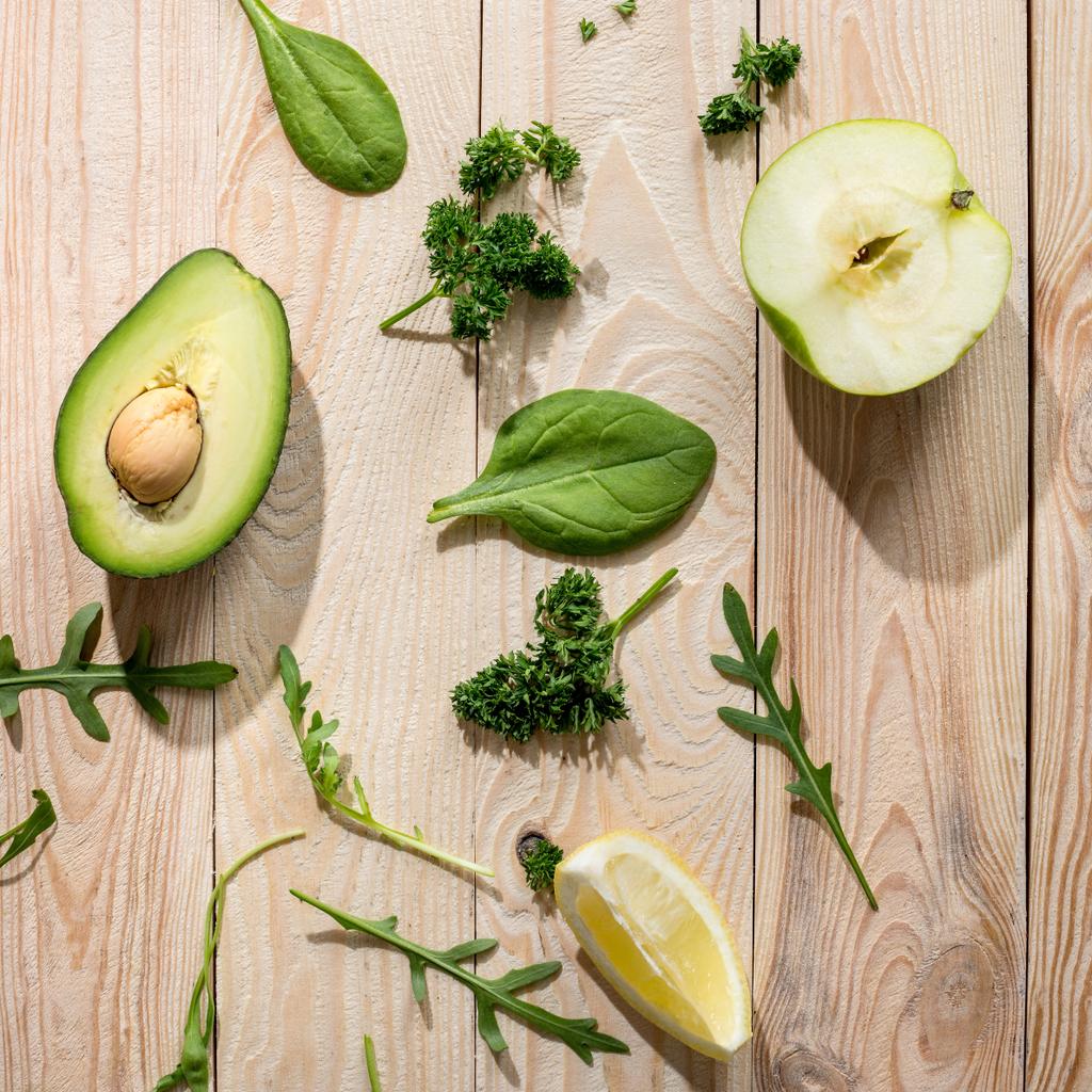 Sliced avocado and greens  - Photo, Image