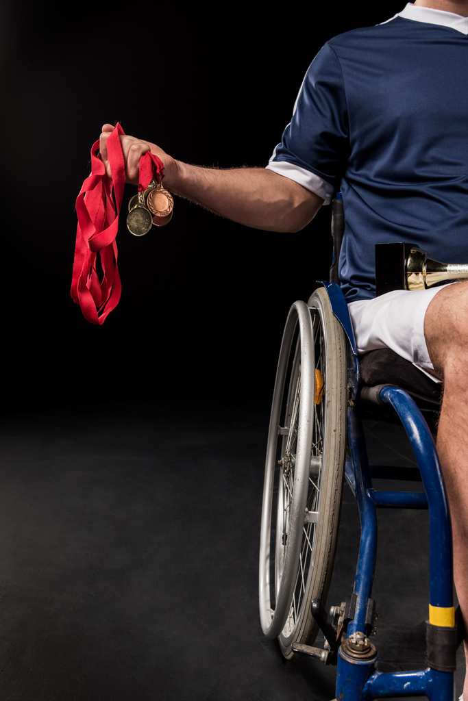 paralympic in wheelchair with trophies - Photo, Image