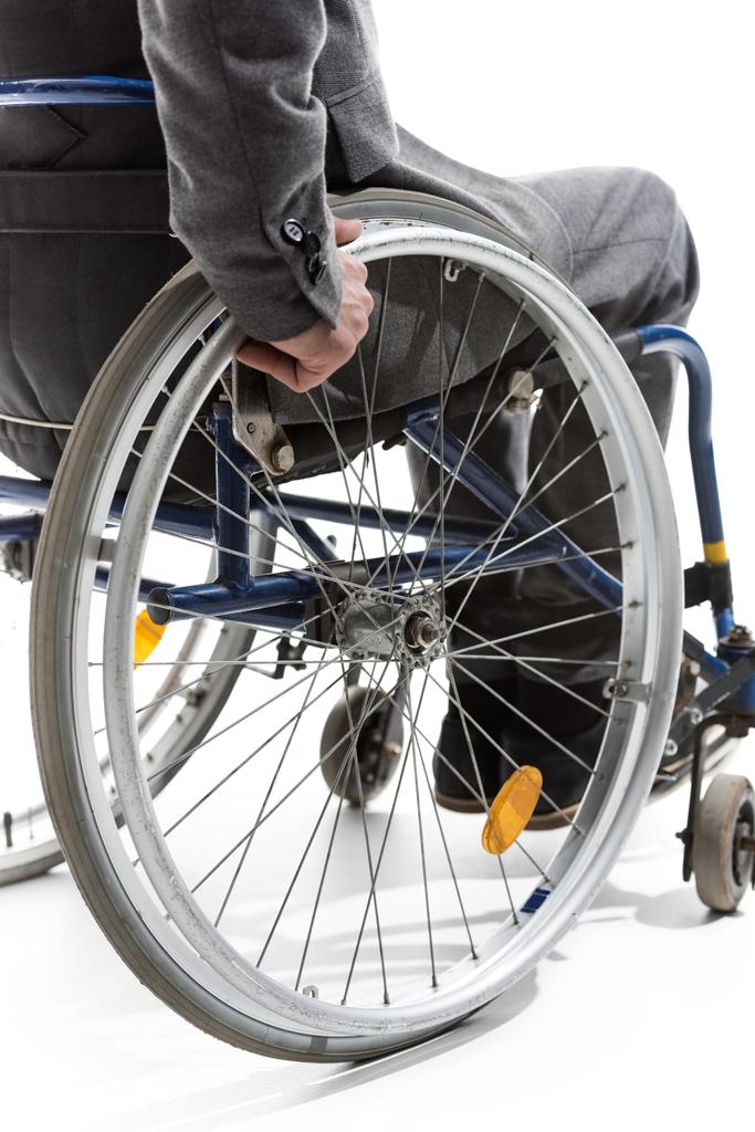 физически неполноценный человек на инвалидной коляске
 - Фото, изображение