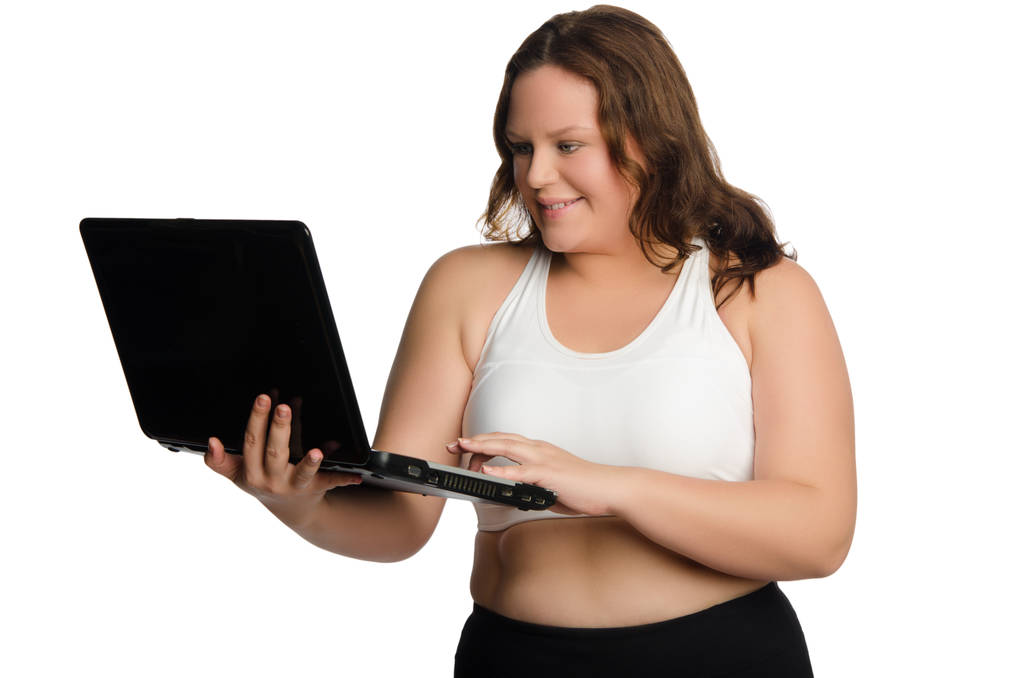 Mujer gorda deportiva con portátil
 - Foto, Imagen