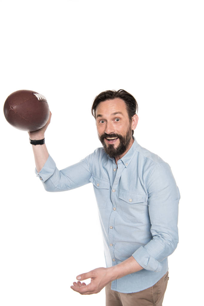 Homme barbu avec balle de rugby
  - Photo, image
