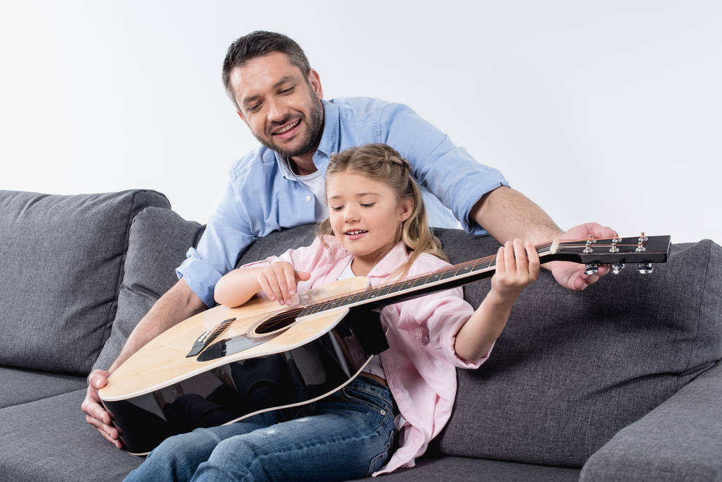 pai com filha tocando guitarra
 - Foto, Imagem