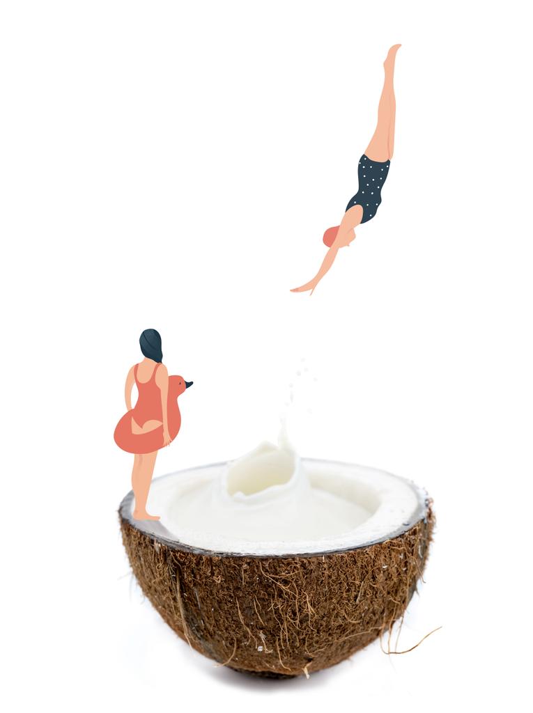 Frau taucht in Kokosnusshälfte ein - Foto, Bild