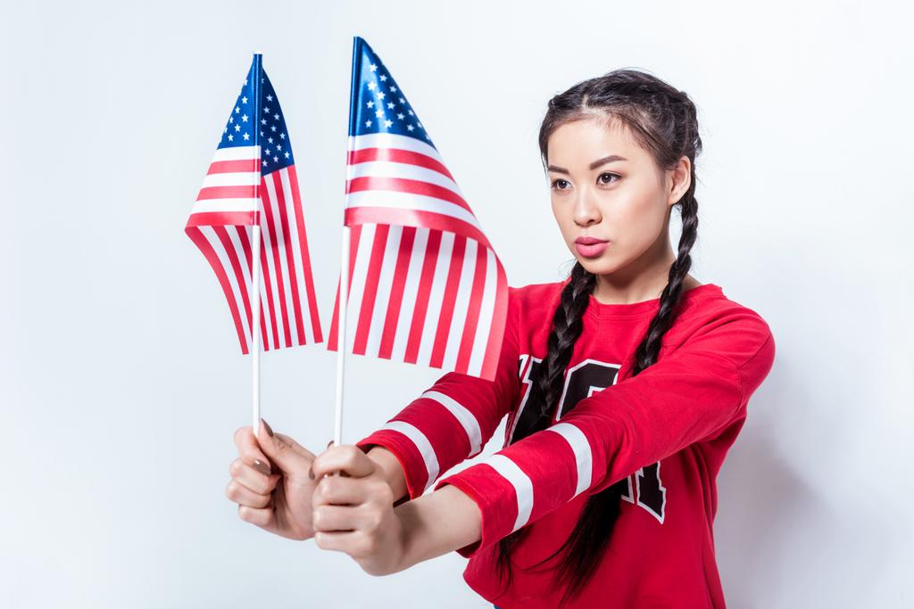 chica con banderas americanas
  - Foto, imagen
