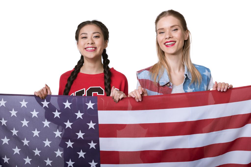 mujeres multiétnicas con bandera de Estados Unidos
 - Foto, imagen