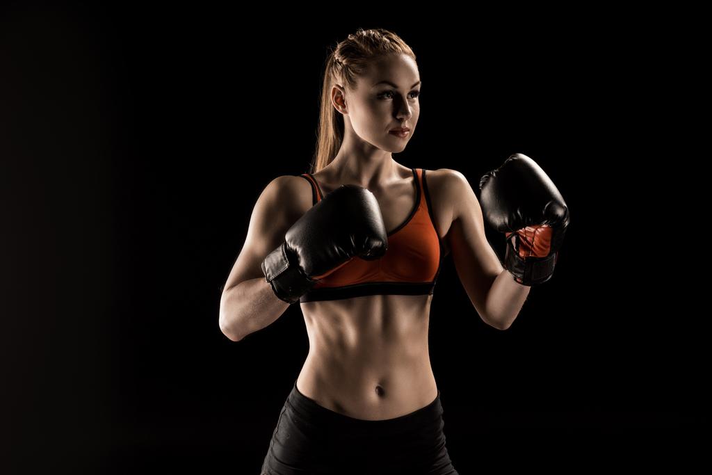 Спортсменка в боксёрских перчатках
  - Фото, изображение