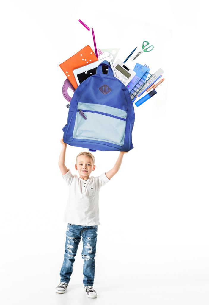 menino segurando saco com ferramentas de educação
 - Foto, Imagem