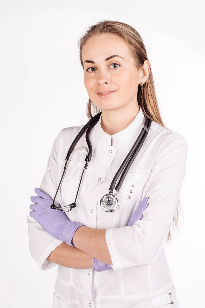 pharmacienne avec bras croisés sur fond blanc
 - Photo, image