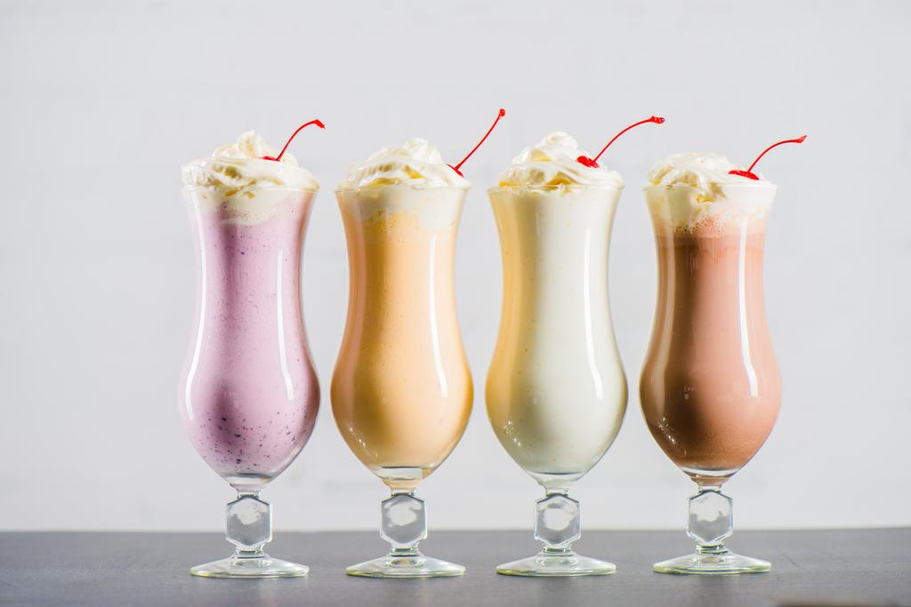 various sweet milkshakes in glasses - Photo, Image