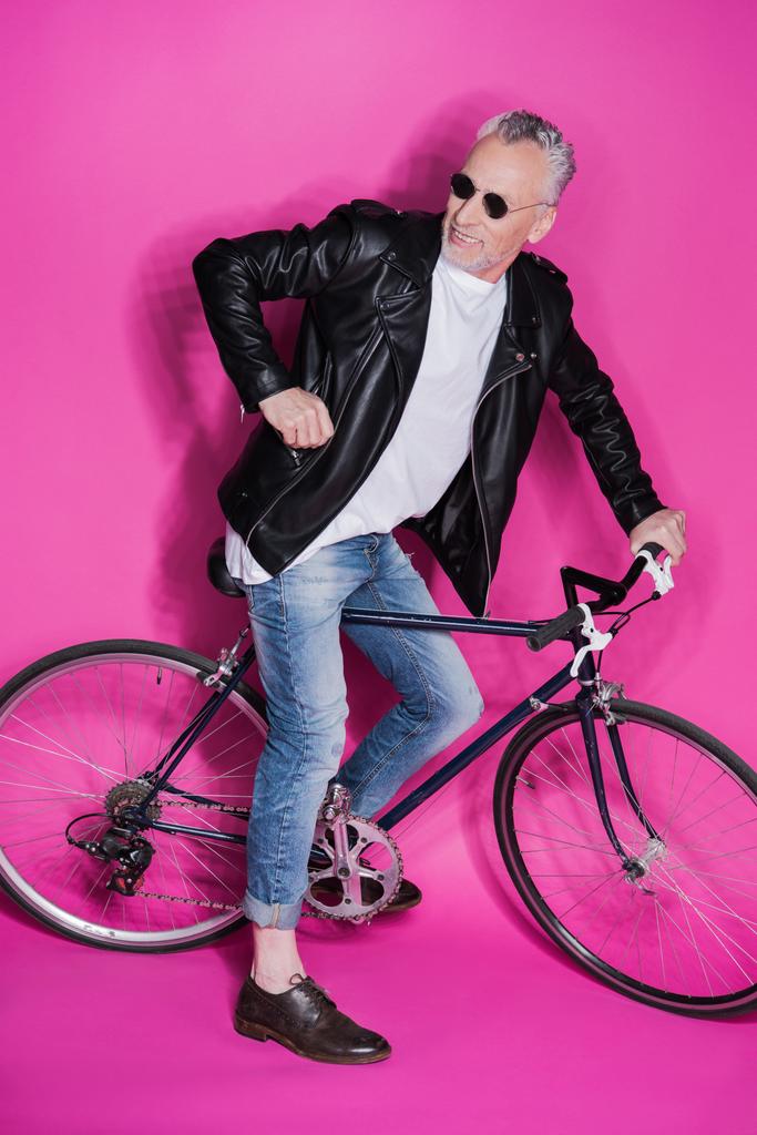 stylish senior man with bicycle - Photo, Image