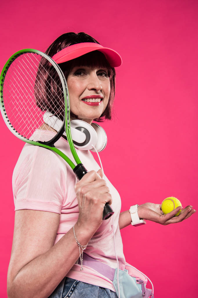 Donna con racchetta da tennis e palla
 - Foto, immagini