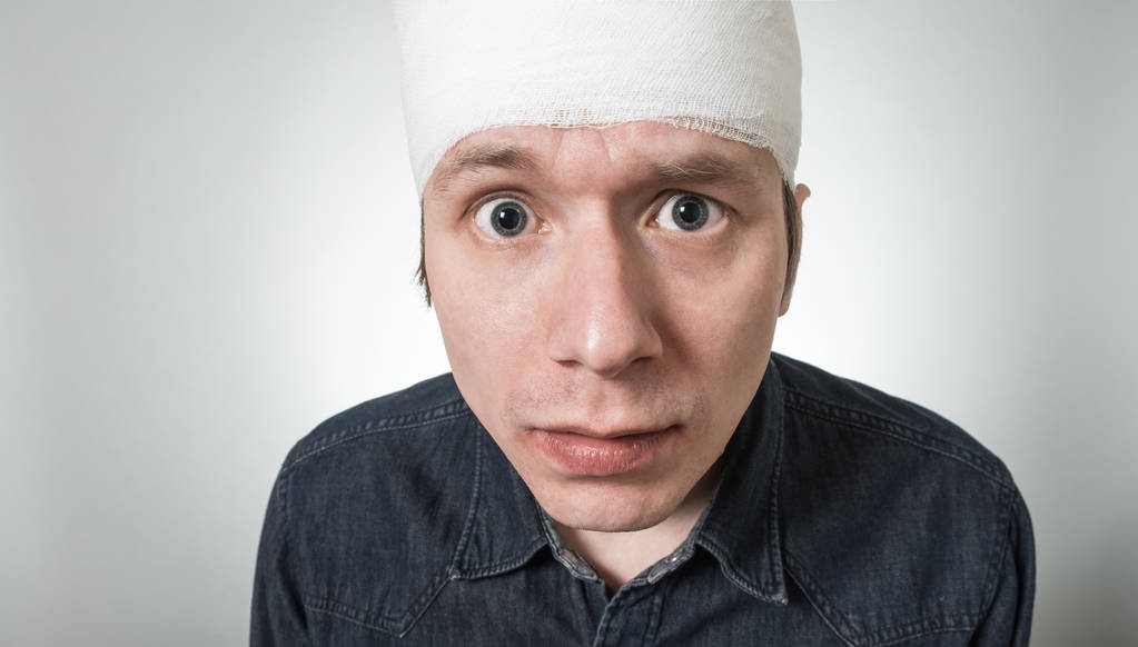 Man with bandage on his head - Photo, Image