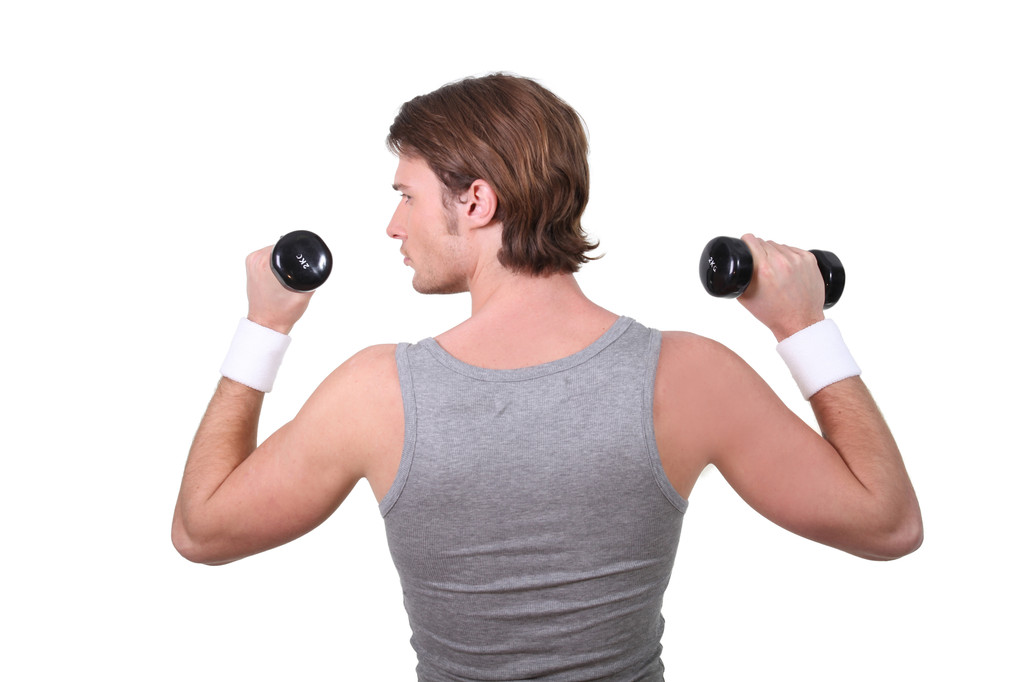 Hombre haciendo ejercicio con pesas - Foto, Imagen