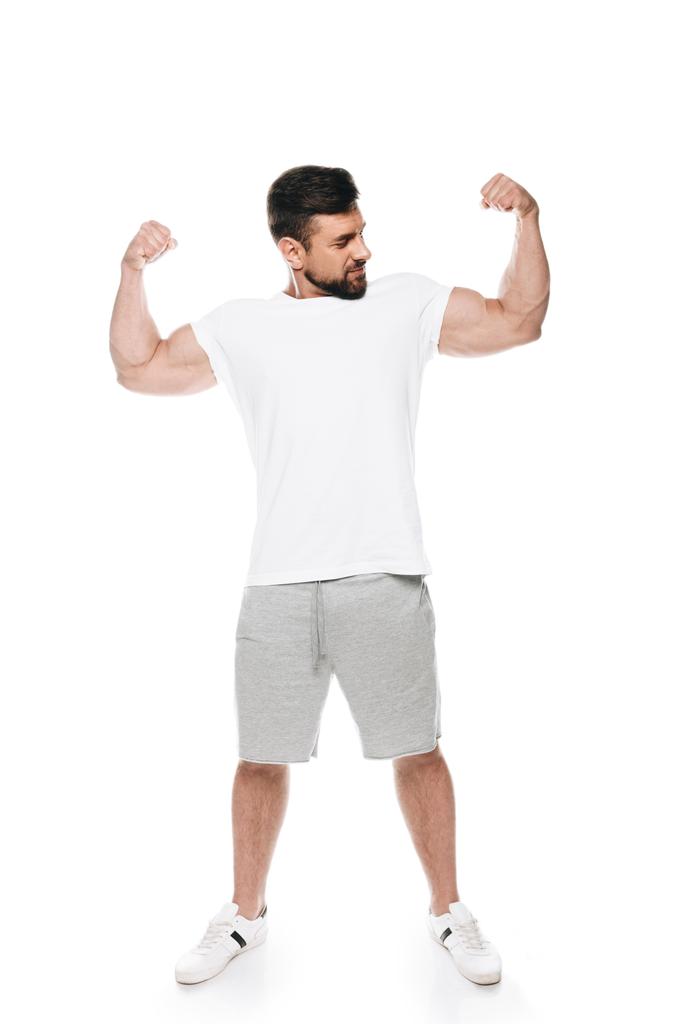 Homme montrant ses biceps
  - Photo, image