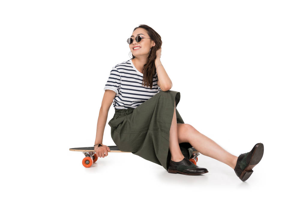 Hipster girl with skateboard  - Photo, Image