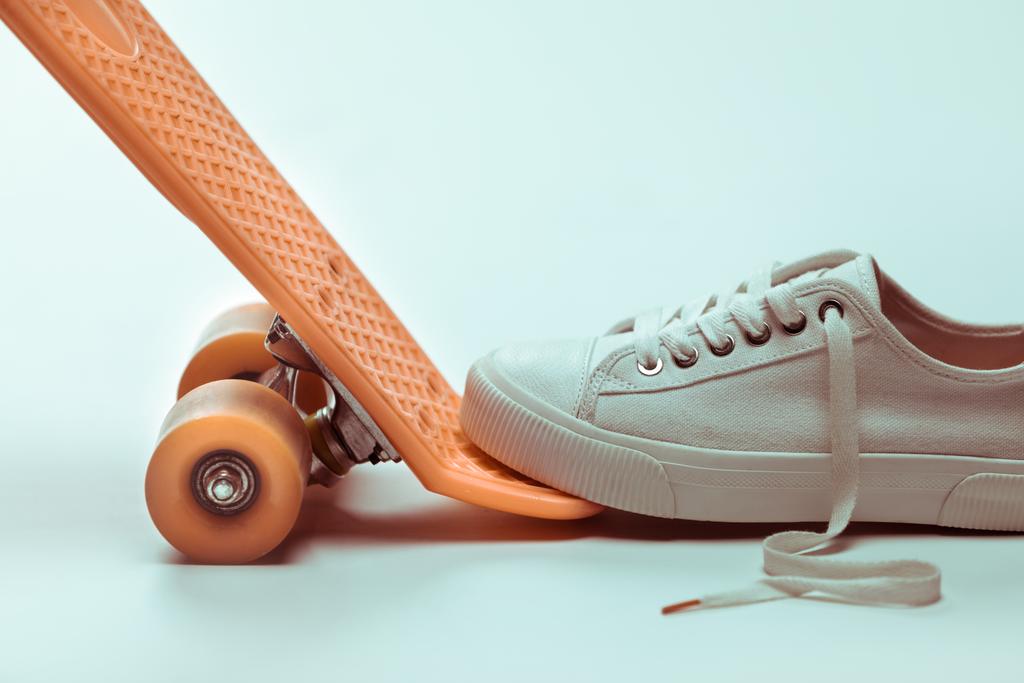 Hipster skateboard and sneaker  - Photo, Image