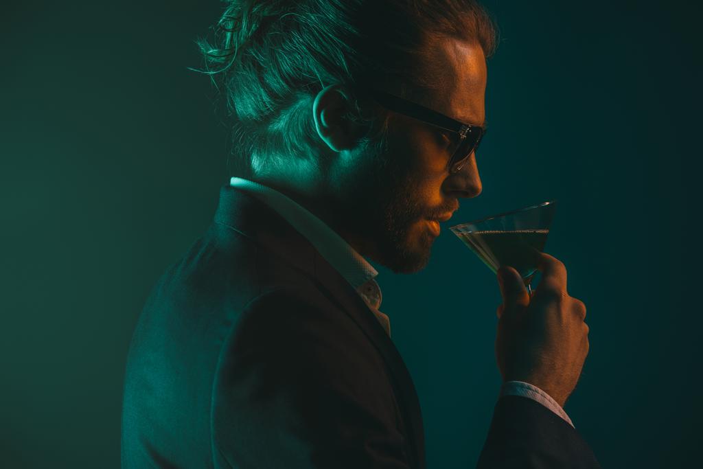man in suit drinking cocktail from glass - Photo, Image