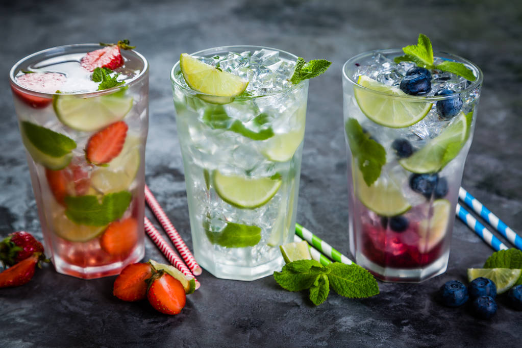 Selection of colorful mojitoes in glasses - Photo, Image
