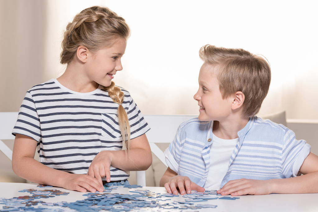 siblings playing with puzzle - Photo, Image