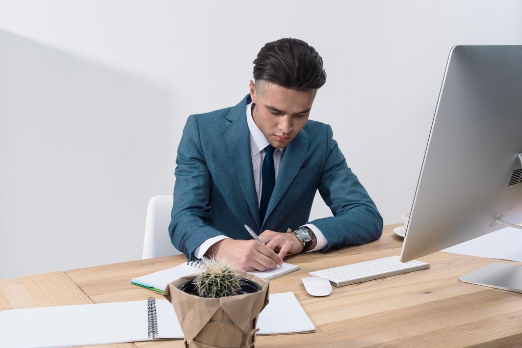 Young businessman at workplace - Photo, Image