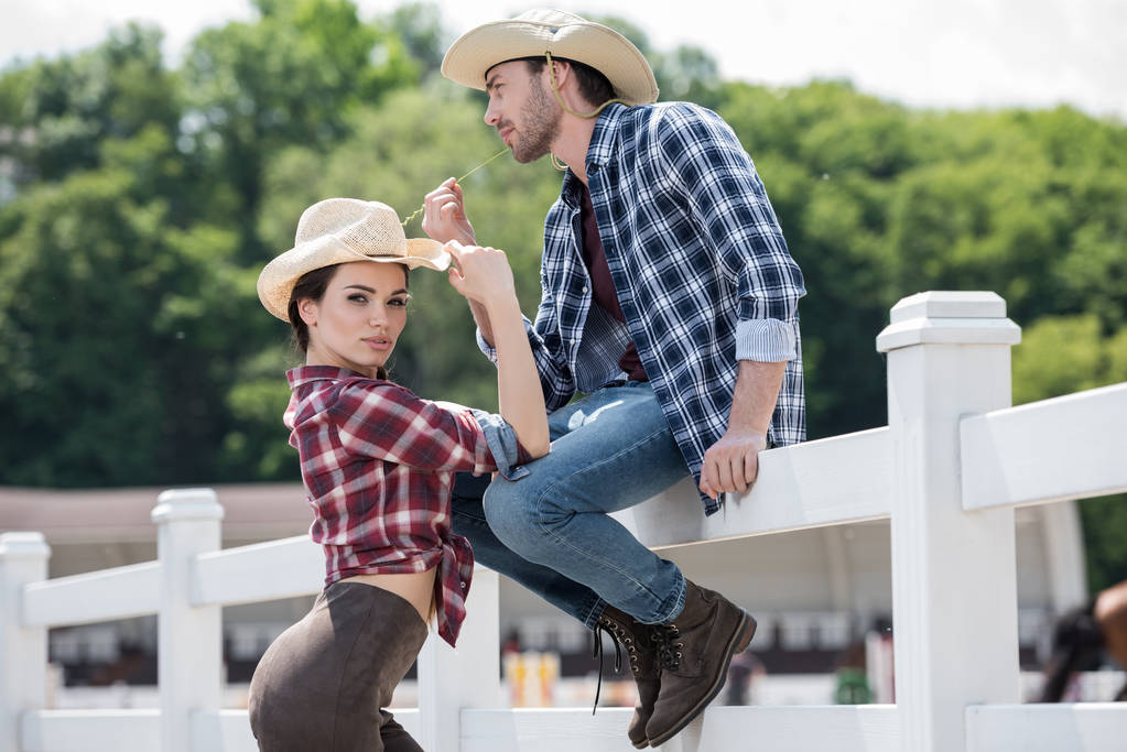 cowboy style couple posing on ranch - Photo, Image