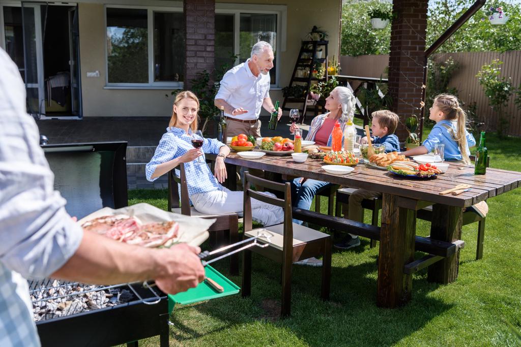 Happy family at barbecue  - Photo, Image