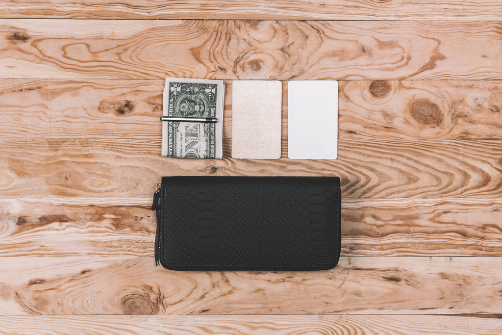 clutch bag with dollars and blank notes - Photo, Image