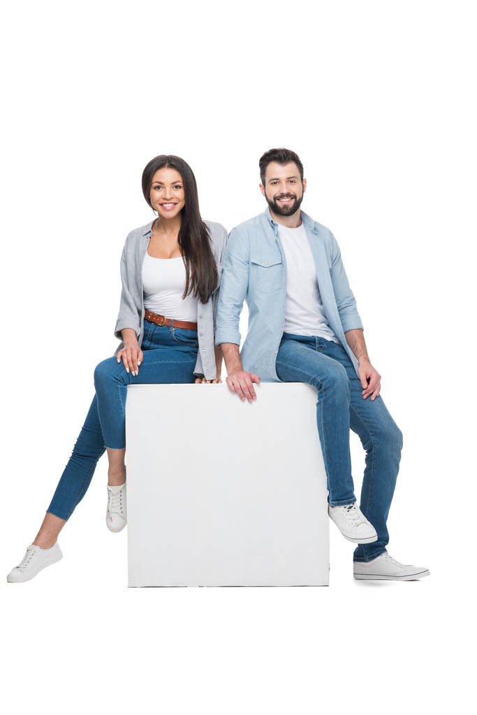 couple sitting on cube - Photo, Image