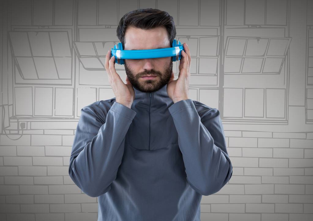 Людина в синій гарнітурі віртуальної реальності
 - Фото, зображення