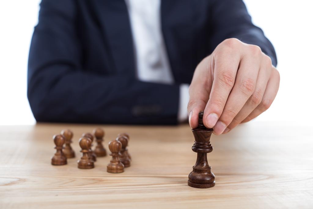 Empresário jogando xadrez
 - Foto, Imagem