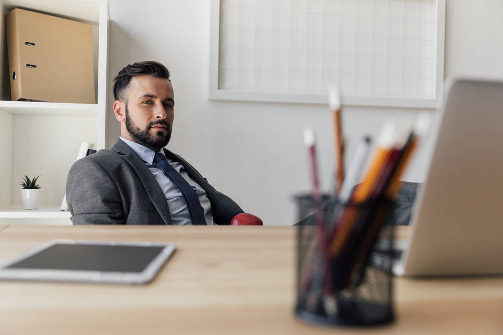 businessman sitting at workplace - Photo, Image