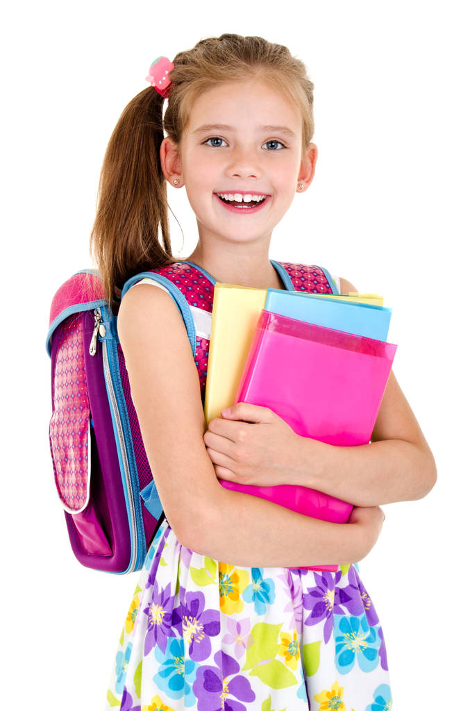 Mosolygós iskolás lány portréja iskolatáskával és könyvekkel  - Fotó, kép