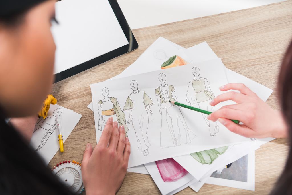 fashion designers working with blueprints - Photo, Image