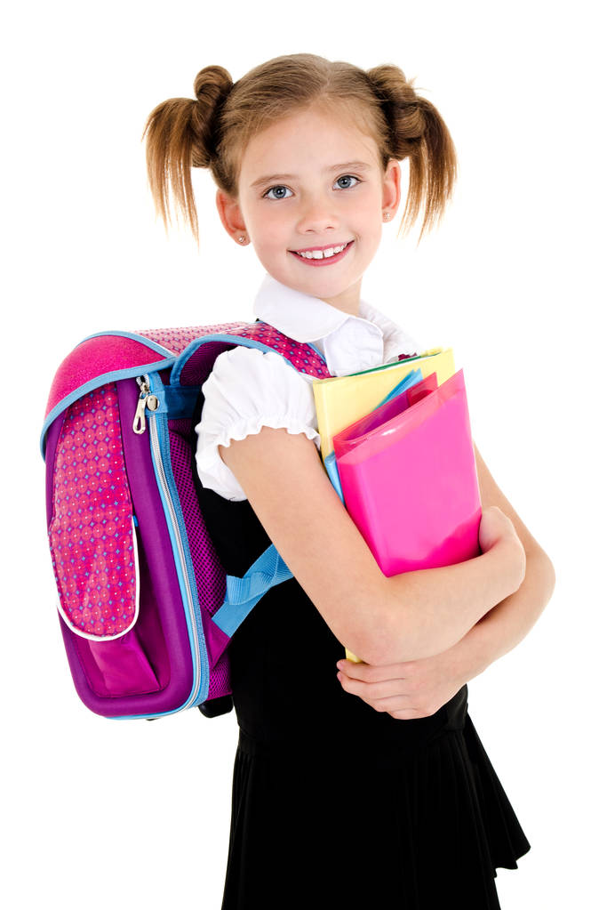 Portrait of smiling school girl child with backpack and books in - Photo, Image