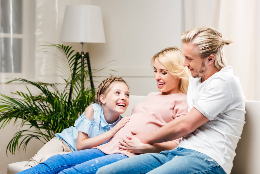 family with pregnant mother at home  - Photo, Image